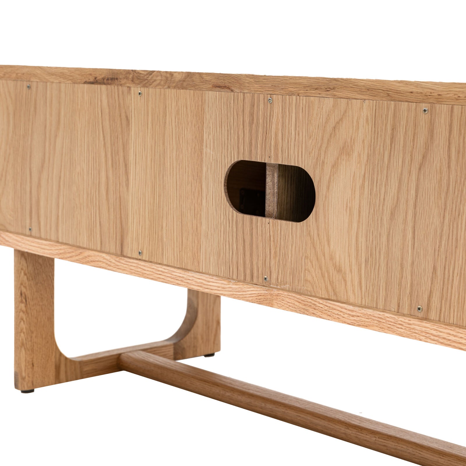 Kantu oak media unit with sliding doors and shaped underframe in natural finish | malletandplane.com