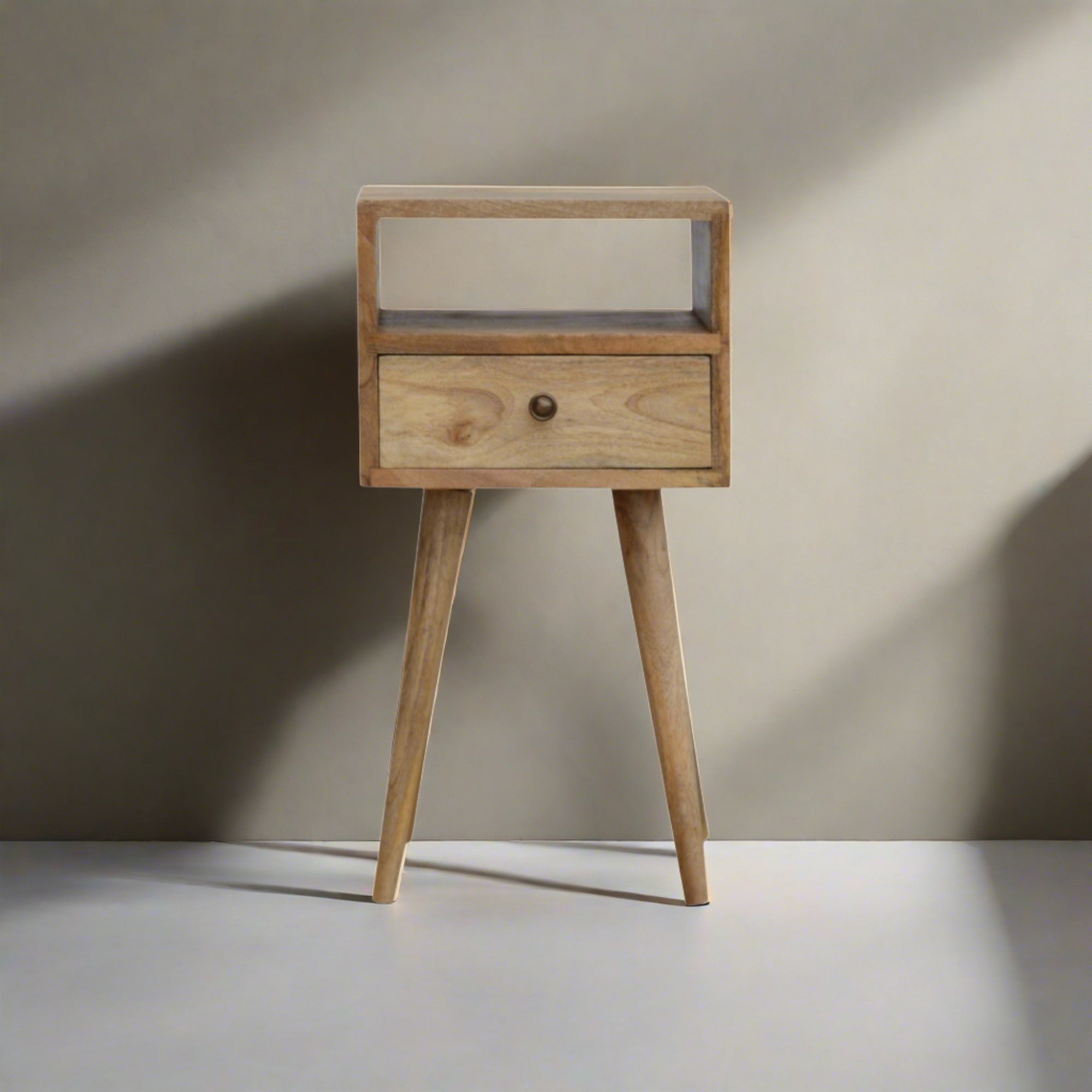 Ronan handmade solid mango wood small bedside table in a fine mango finish | malletandplane.com