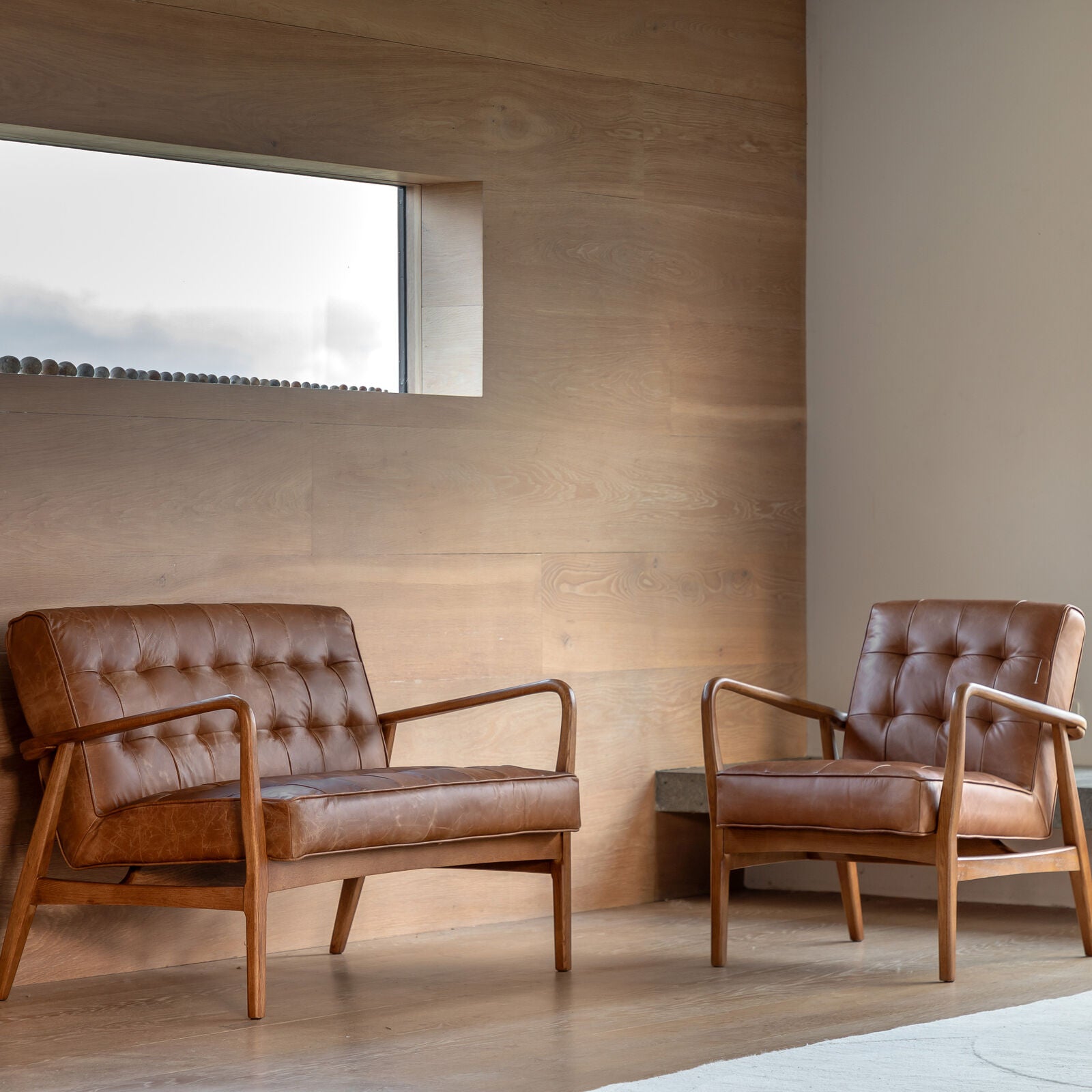 Ronson 2 seat mid-century sofa in vintage brown leather upholstery | malletandplane.com