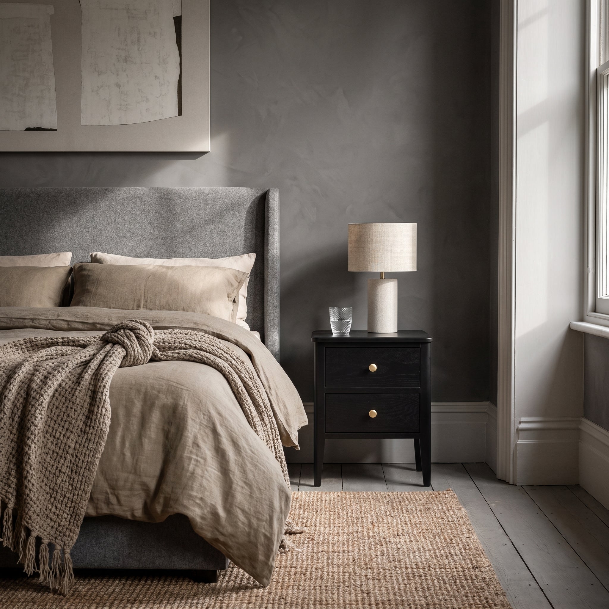 Alvar Black Two Drawer Bedside Table with gold handles and raised base