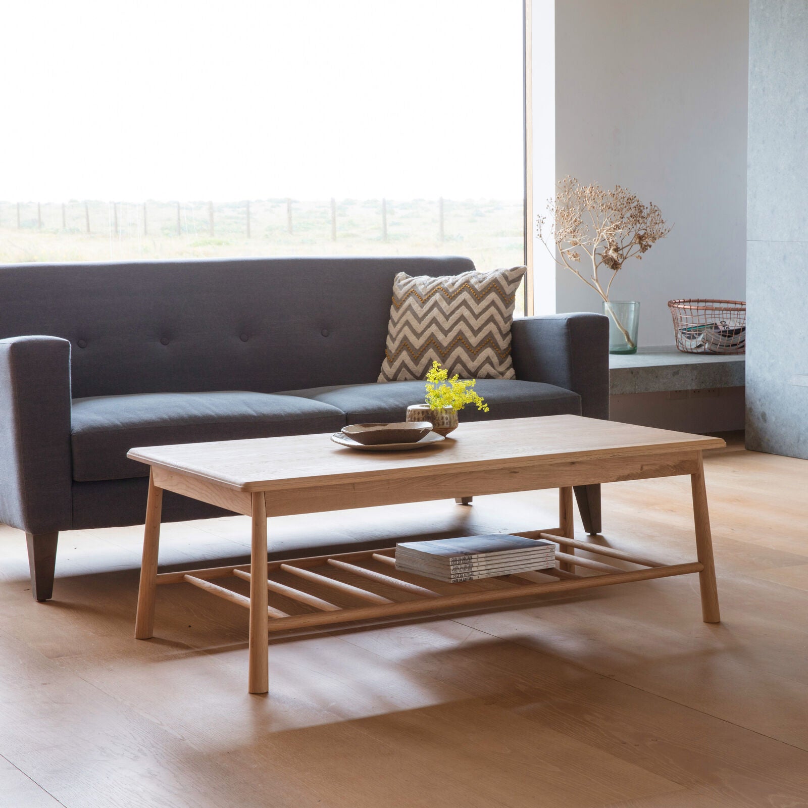 Axel natural oak coffee table with spindle shelf | malletandplane.com