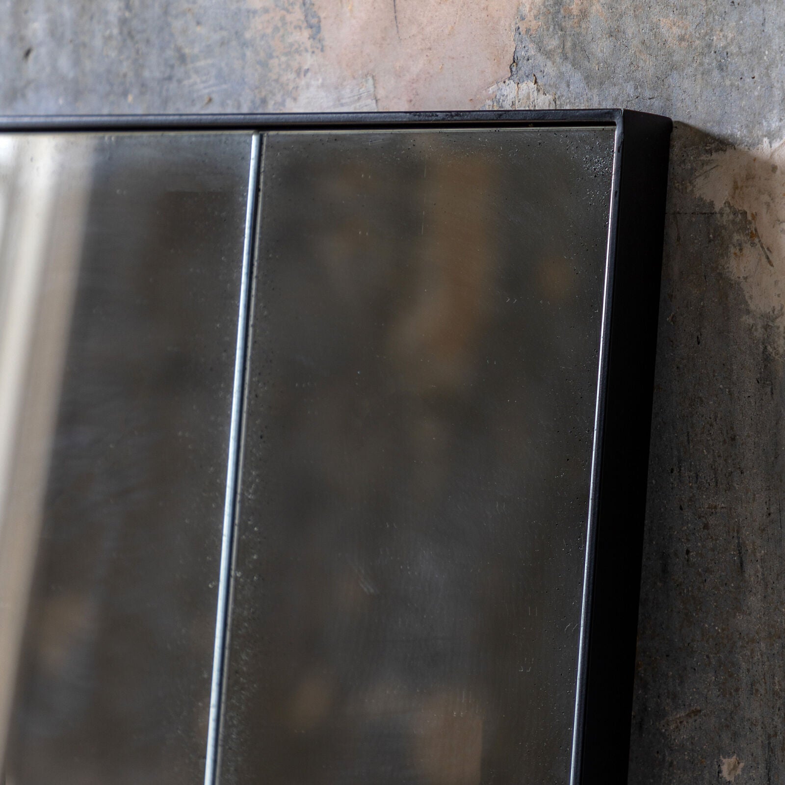Baxter full length antiqued wall mirror with large rectangular mirrored panes in a structural metal outer frame | malletandplane.com