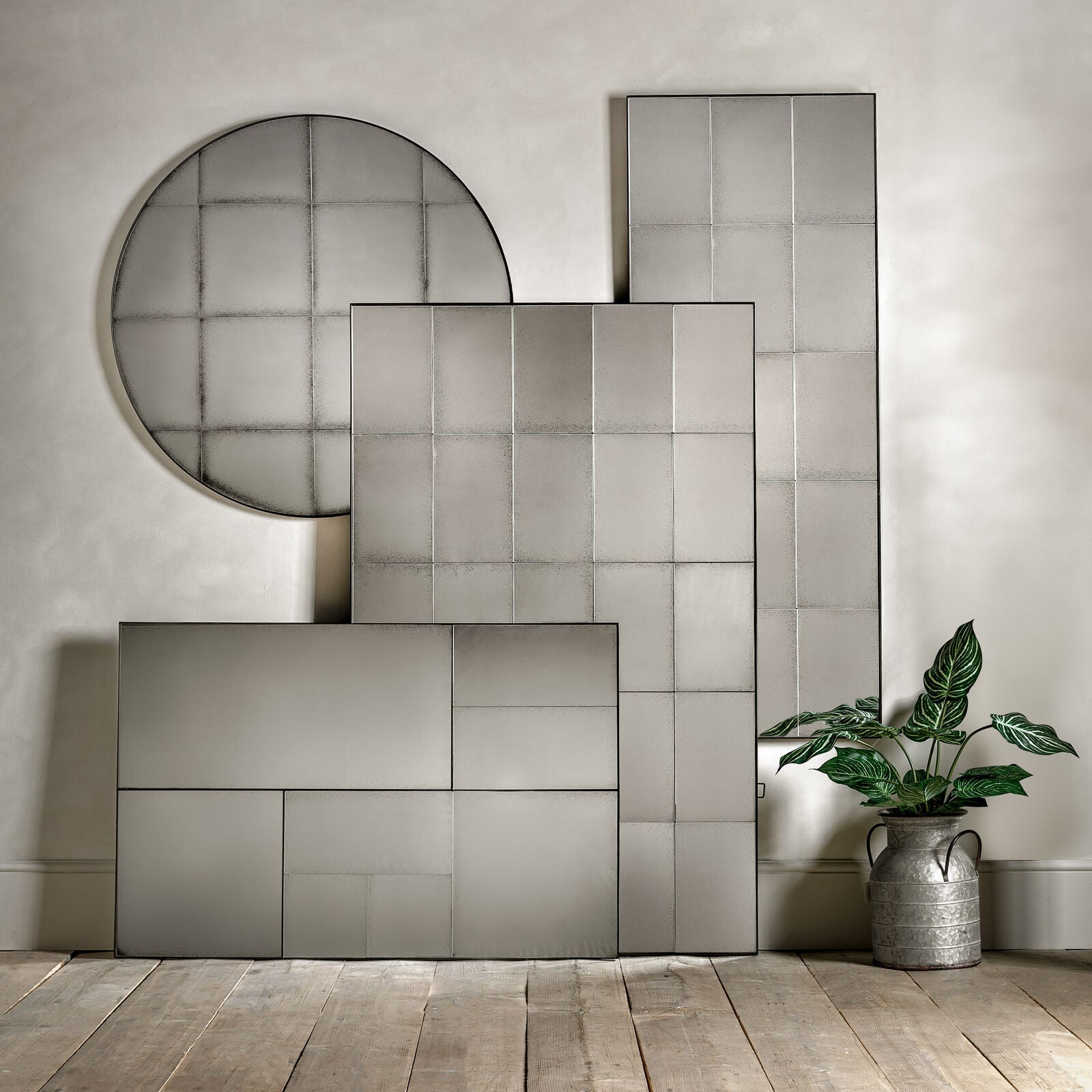Baxter full length antiqued wall mirror with large rectangular mirrored panes in a structural metal outer frame | malletandplane.com