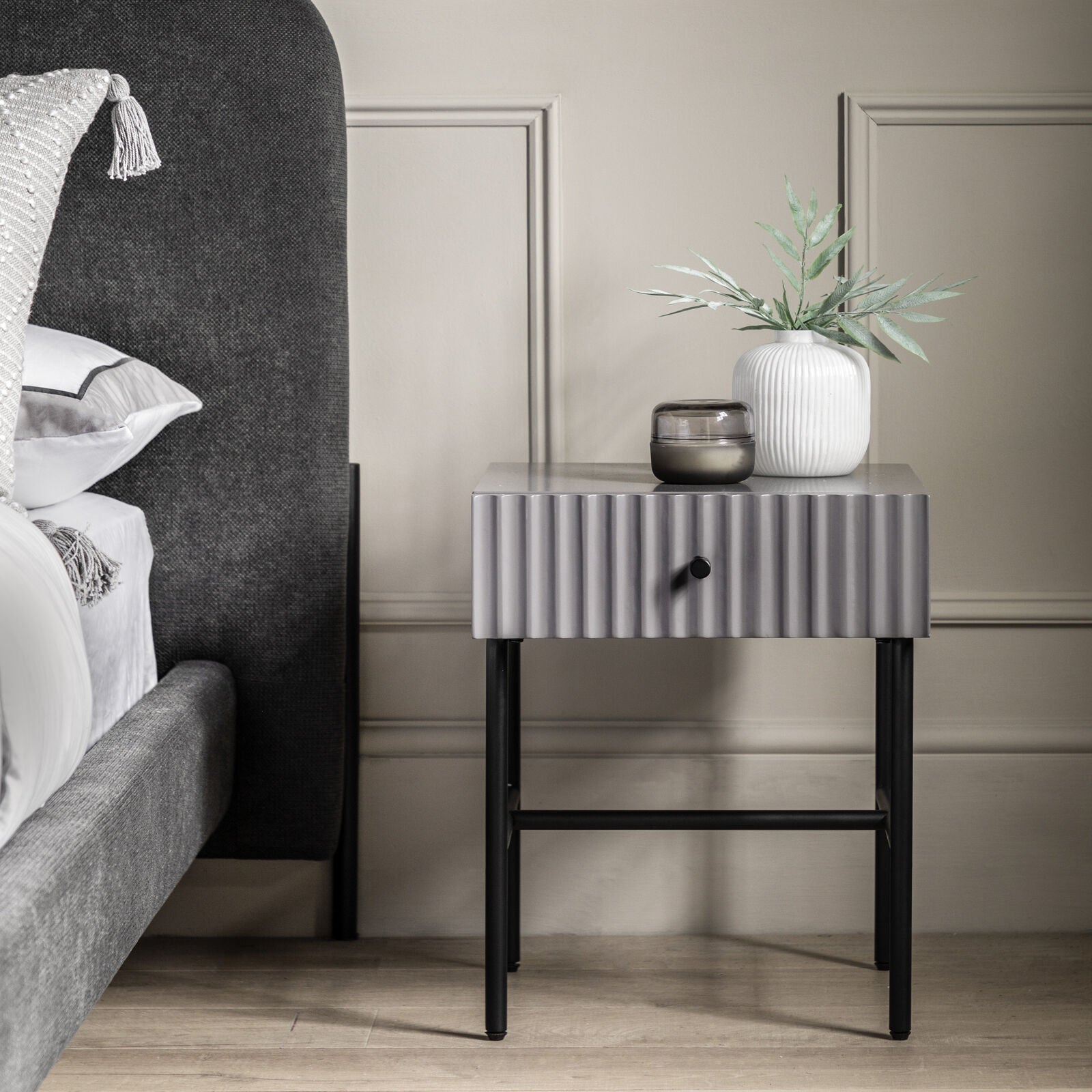 Flute bedside table with drawer in grey finish with scalloped fascia and black metal underframe | malletandplane.com