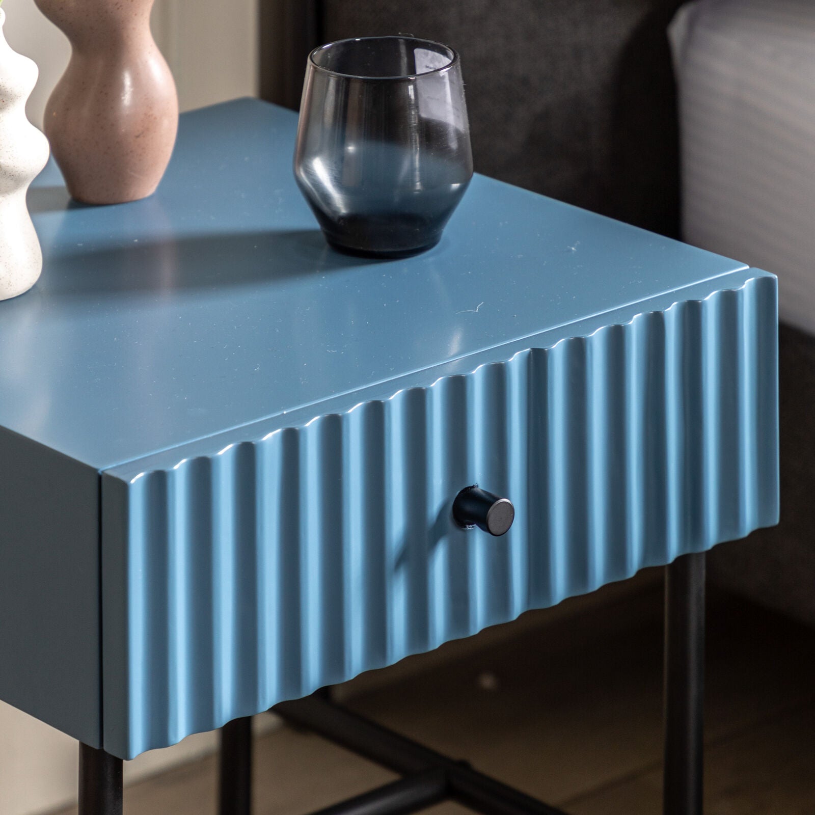 Flute bedside table with drawer in blue finish with scalloped fascia and black metal underframe | malletandplane.com