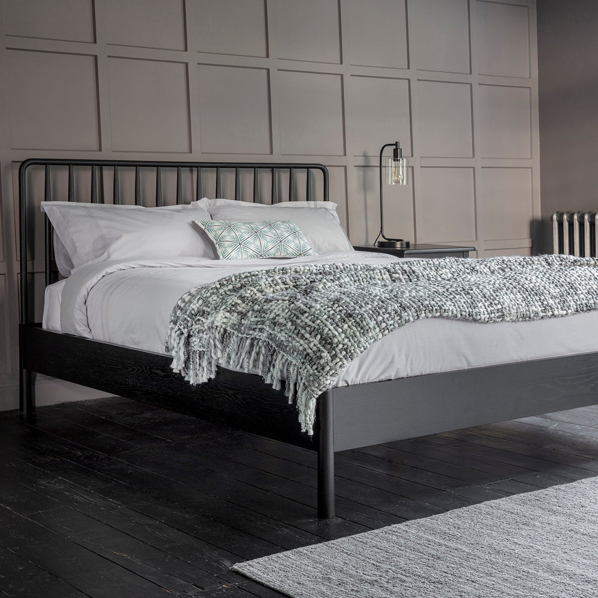 Axel black oak double bed with spindle details in cernacular style | malletandplane.com