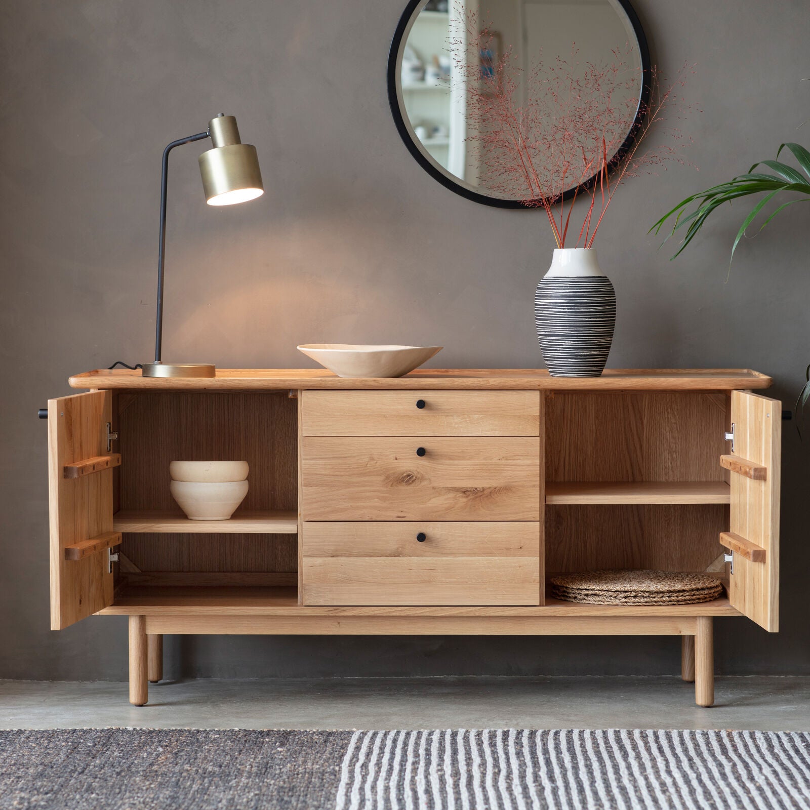 Alfie oak sideboard with 3 drawers and 2 cupboards and a choice of black or natural handles | malletandplane.com