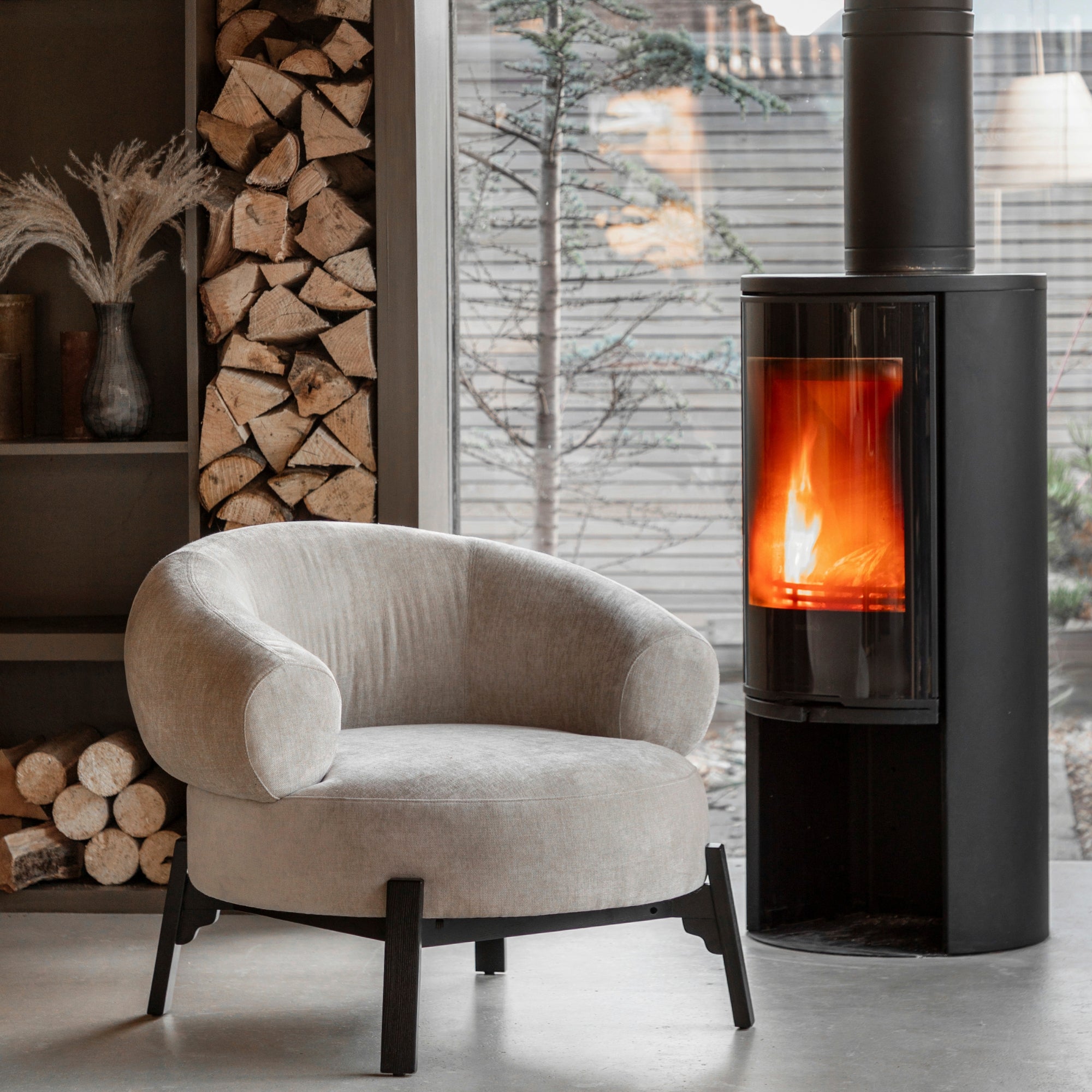 Harvey natural curved armchair with dark wood base frame and legs | malletandplane.com