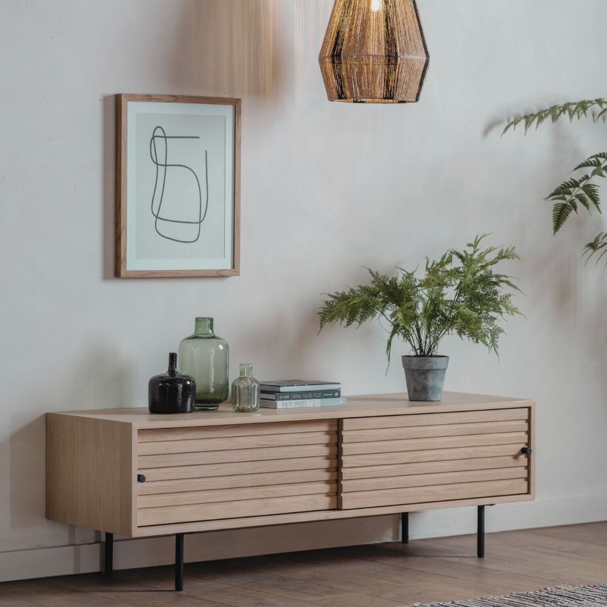 Kori oak and steel media unit with sliding doors and Japandi slatted detailing | malletandplane.com