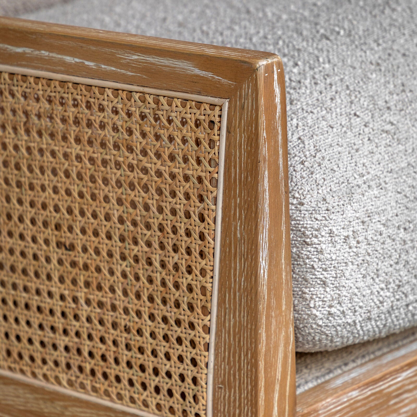 Osaka Natural Rattan Armchair with solid wood frame, woven rattan backrest and cream upholstered seat — stylish Scandinavian accent chair for living rooms and bedrooms. | malletandplane.com