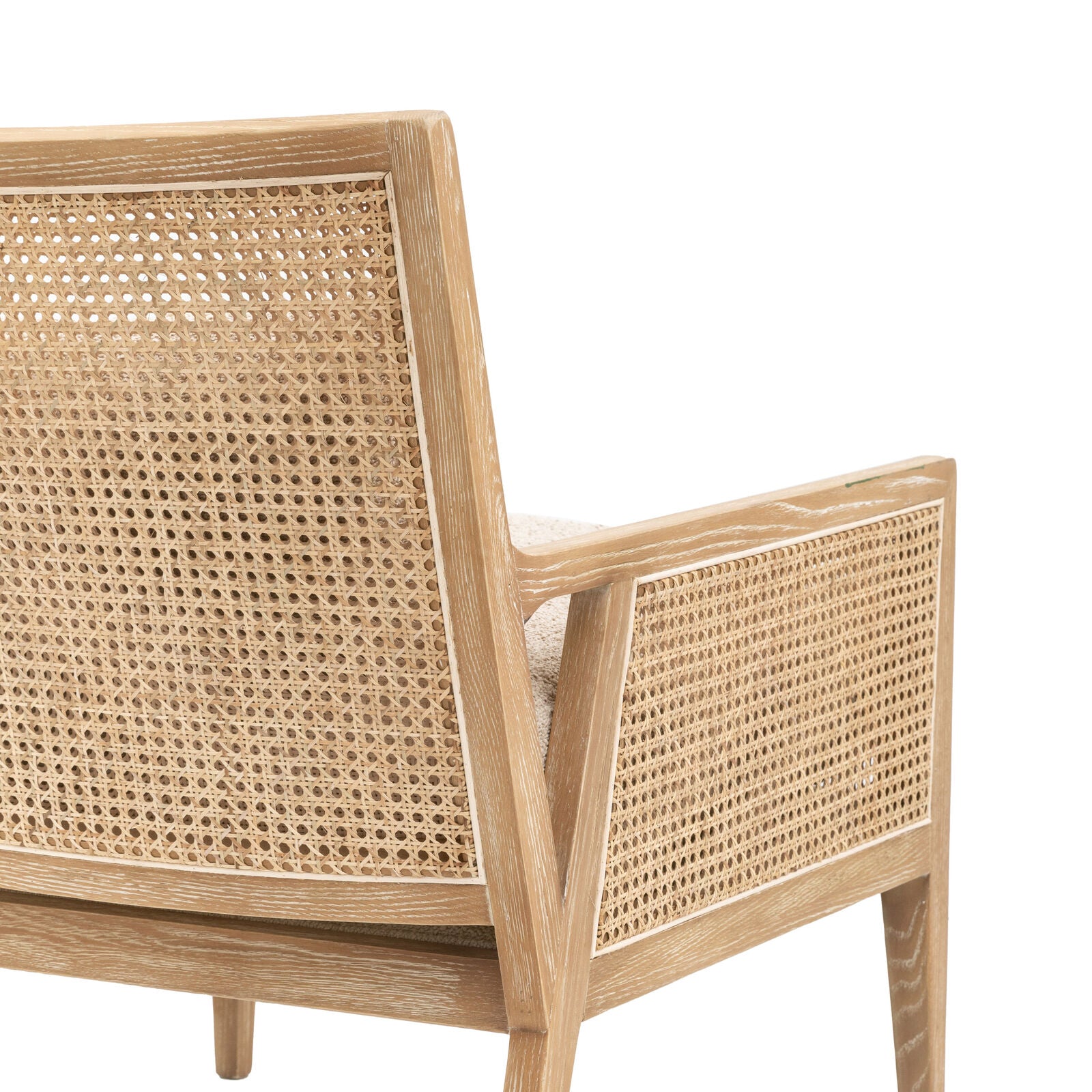 Osaka Natural Rattan Armchair with solid wood frame, woven rattan backrest and cream upholstered seat — stylish Scandinavian accent chair for living rooms and bedrooms. | malletandplane.com