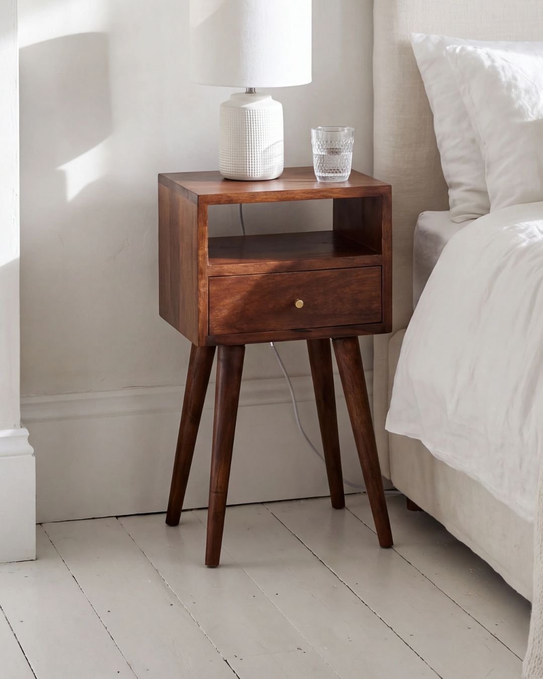 Ronan handmade solid mango wood small bedside table in a deep chestnut finish
