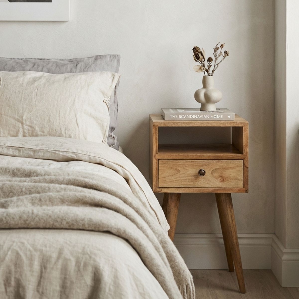 Ronan handmade solid mango wood small bedside table in a fine mango finish