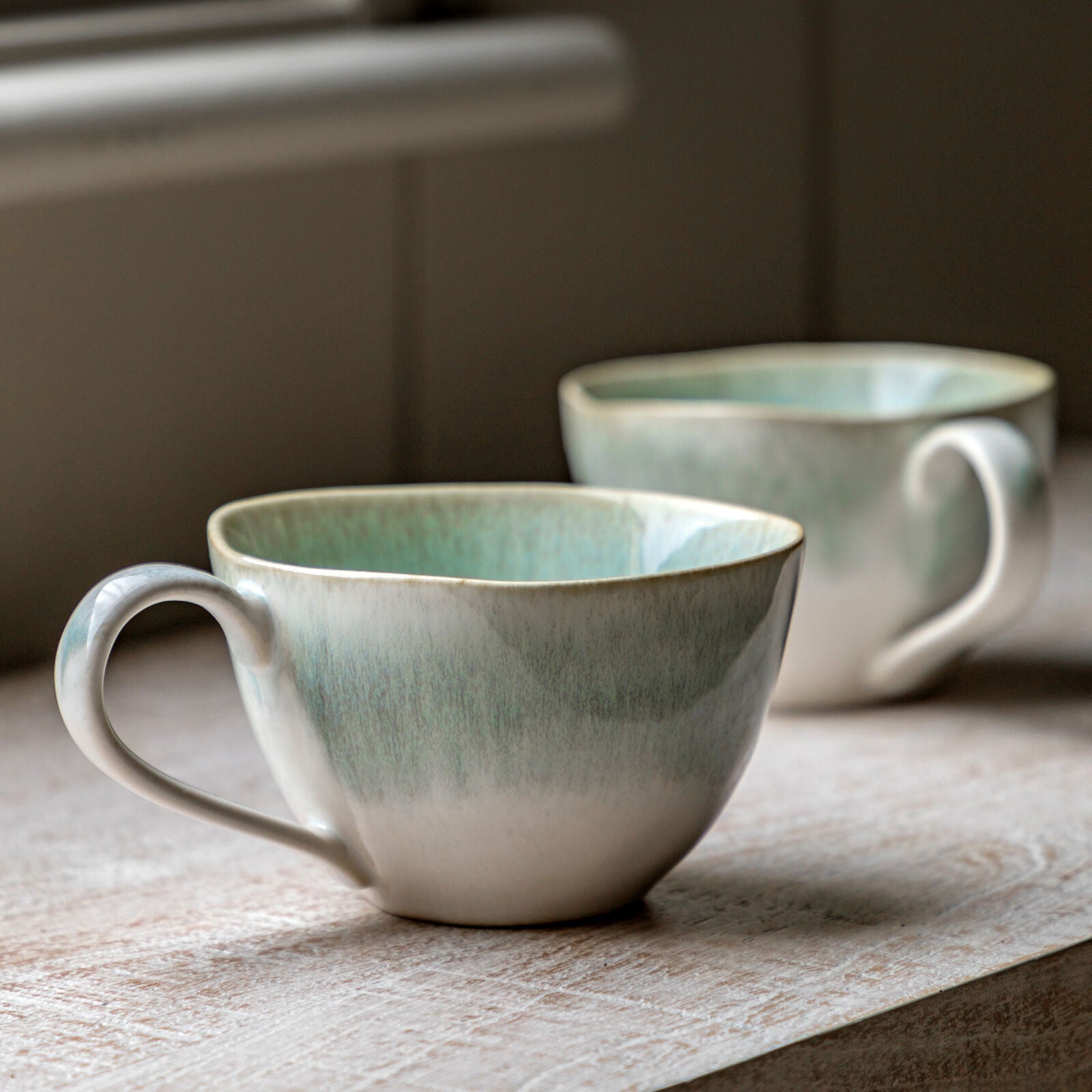 Reactive set of 4 duck egg blue ceramic mugs | malletandplane.com