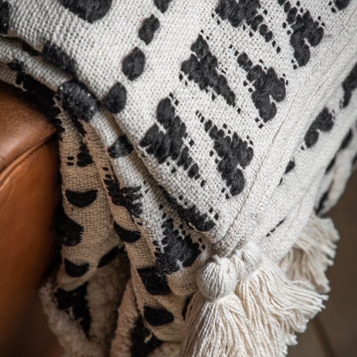 Aztec contemporary tufted cream throw with a beautiful black stitched aztec design | malletandplane.com